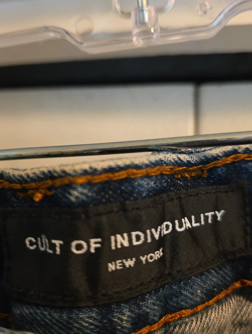 Cult of Individuality Distressed Skinny Jeans in Faded Blue with Zipper Cuffs